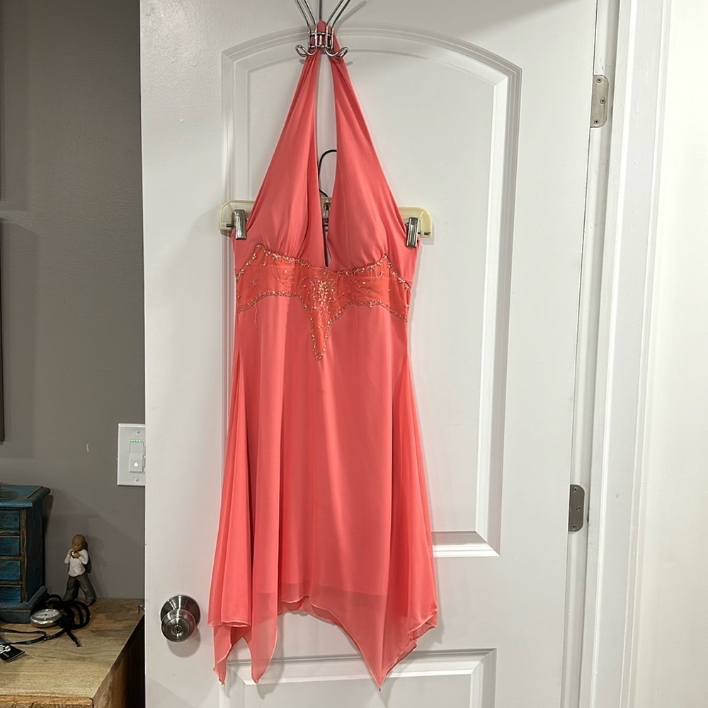 Peach colored silky cocktail dress
